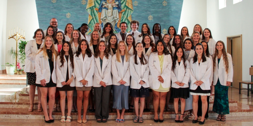College of Saint Mary physician assistant students receive white coats during ceremony