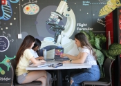 College of Saint Mary students work on a puzzle in the new student lounge on campus.