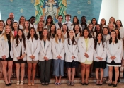 College of Saint Mary physician assistant students receive white coats during ceremony